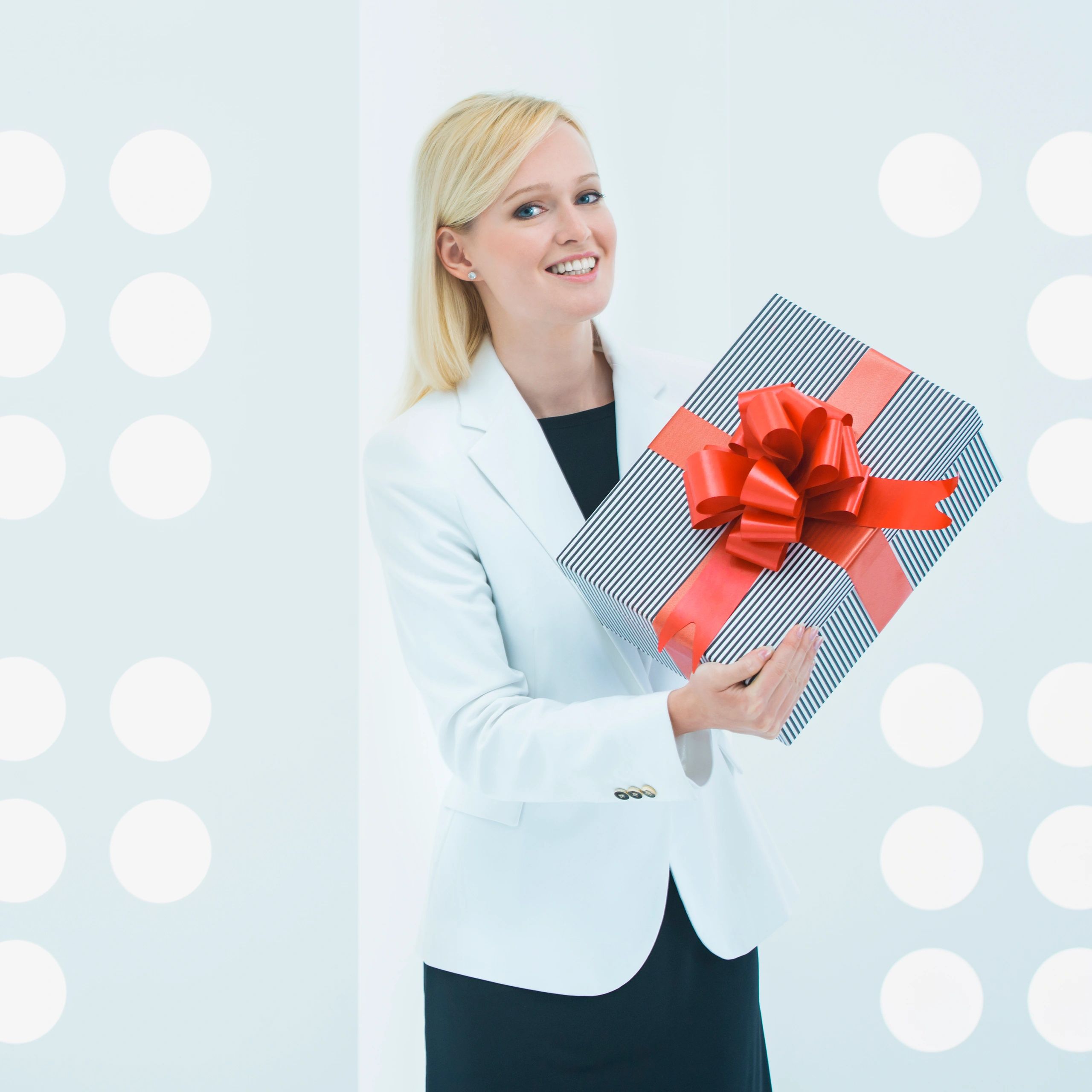 Customer portrait holding a gift